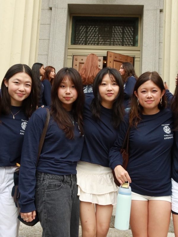 Anna on the senior walk with friends in Phillips Academy shirts