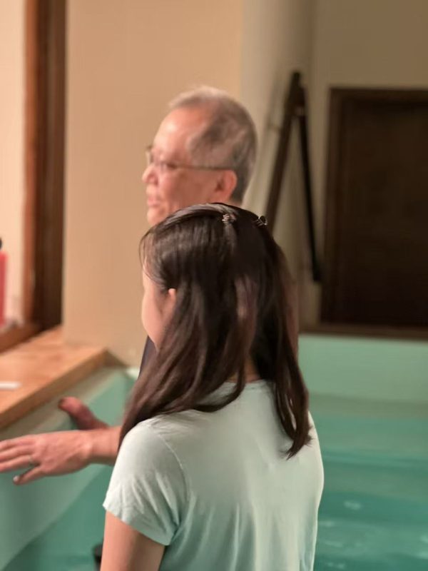 Anna being baptised